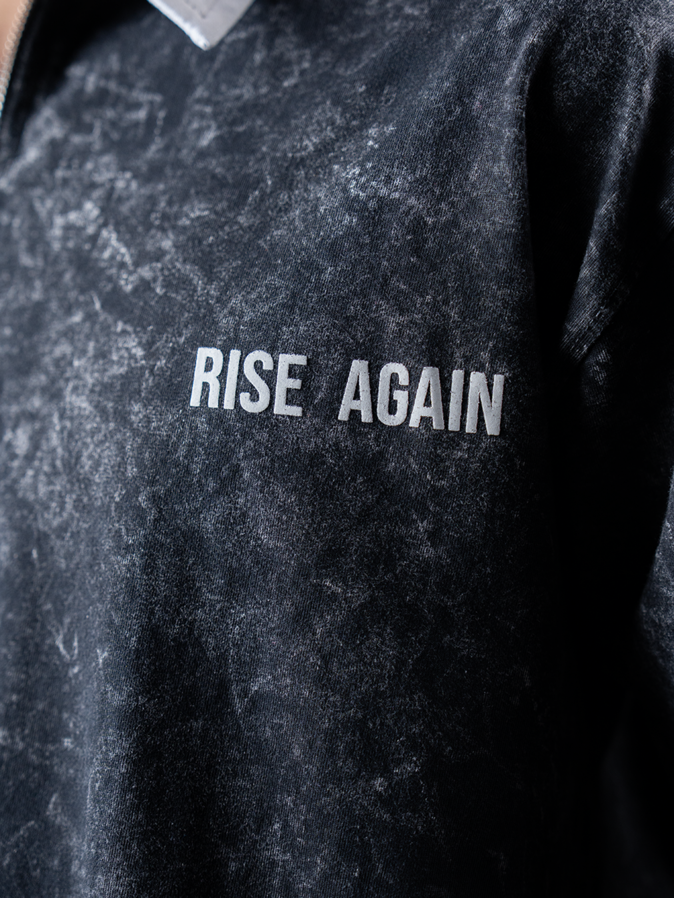 RISE AGAIN POLO TEE - ACID BLACK