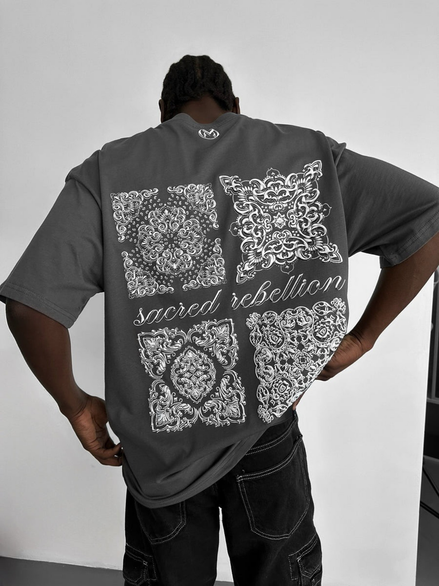 SACRED REBELLION TEE