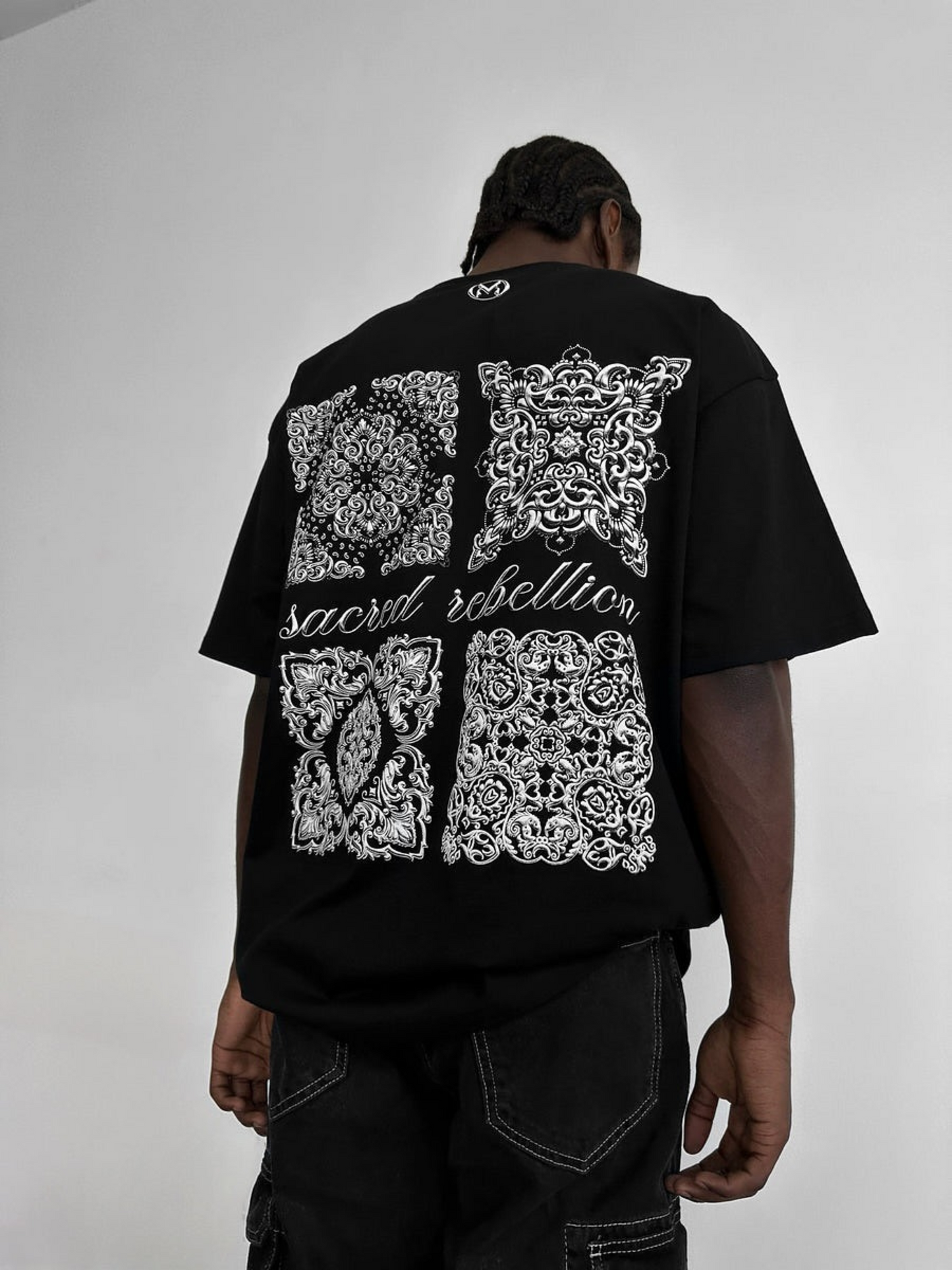SACRED REBELLION TEE